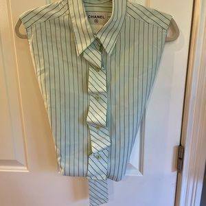 Runway CHANEL sleeveless shirt.